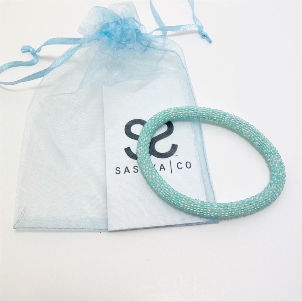 Gorgeous Light Aqua Sashka Hand Beaded Bracelet.